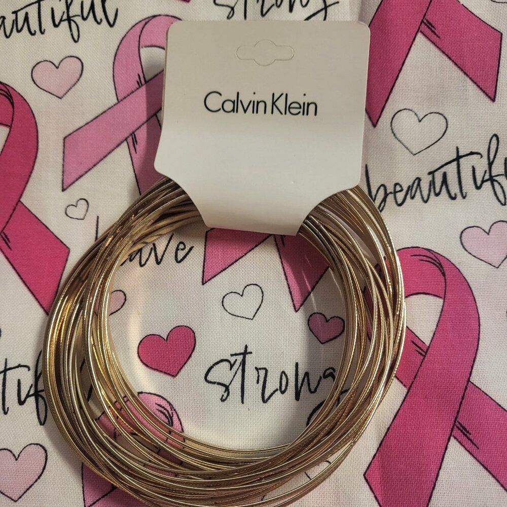 Calvin Klein set of 20 golden textured Bangles